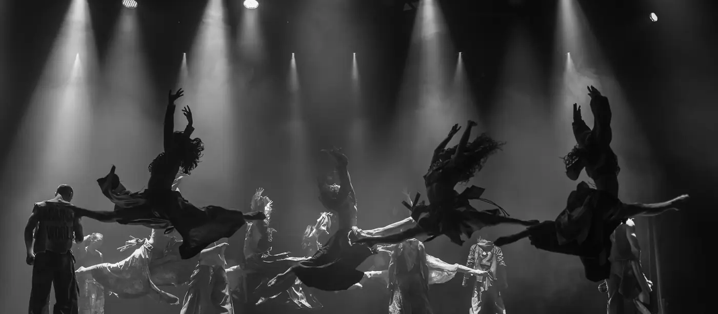 The company on stage